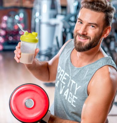 man-with-sports-nutrition-2023-11-27-04-53-32-utc-1